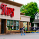 Investigators work the scene after a mass shooting at a supermarket, in Buffalo, N.Y., May 16, 2022. A white 18-year-old entered the supermarket with the goal of killing as many Black patrons as possible and gunned down 10.